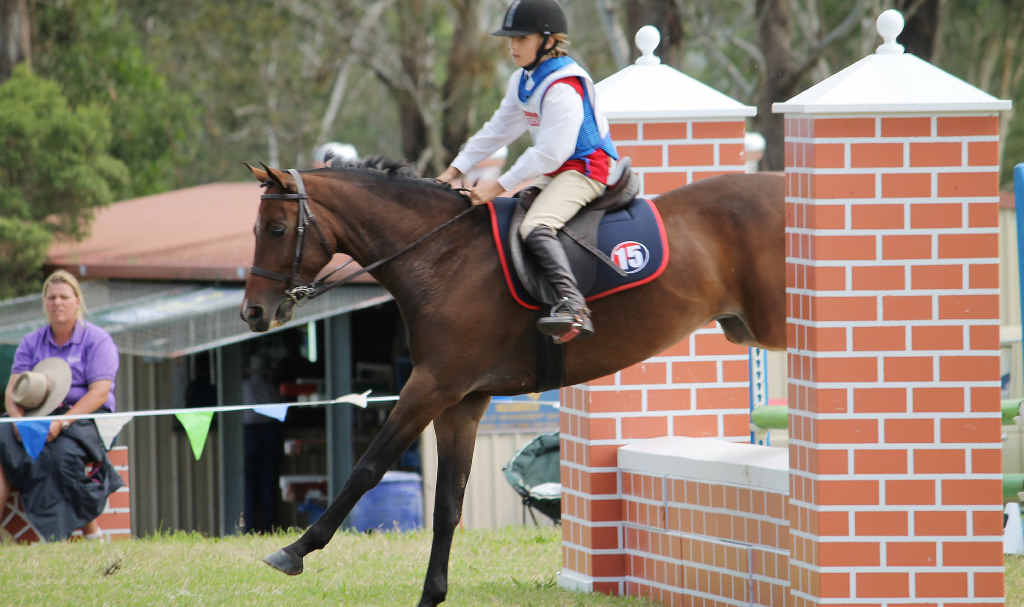 UP AND OVER: Sophie James from the Blackwater Pony Club represents Zone 15 at the PCAQ State Jumping Equitation and Show Jumping Championships. UP AND OVER: Sophie James from the Blackwater Pony Club represents Zone 15 at the PCAQ State Jumping Equitation and Show Jumping Championships.